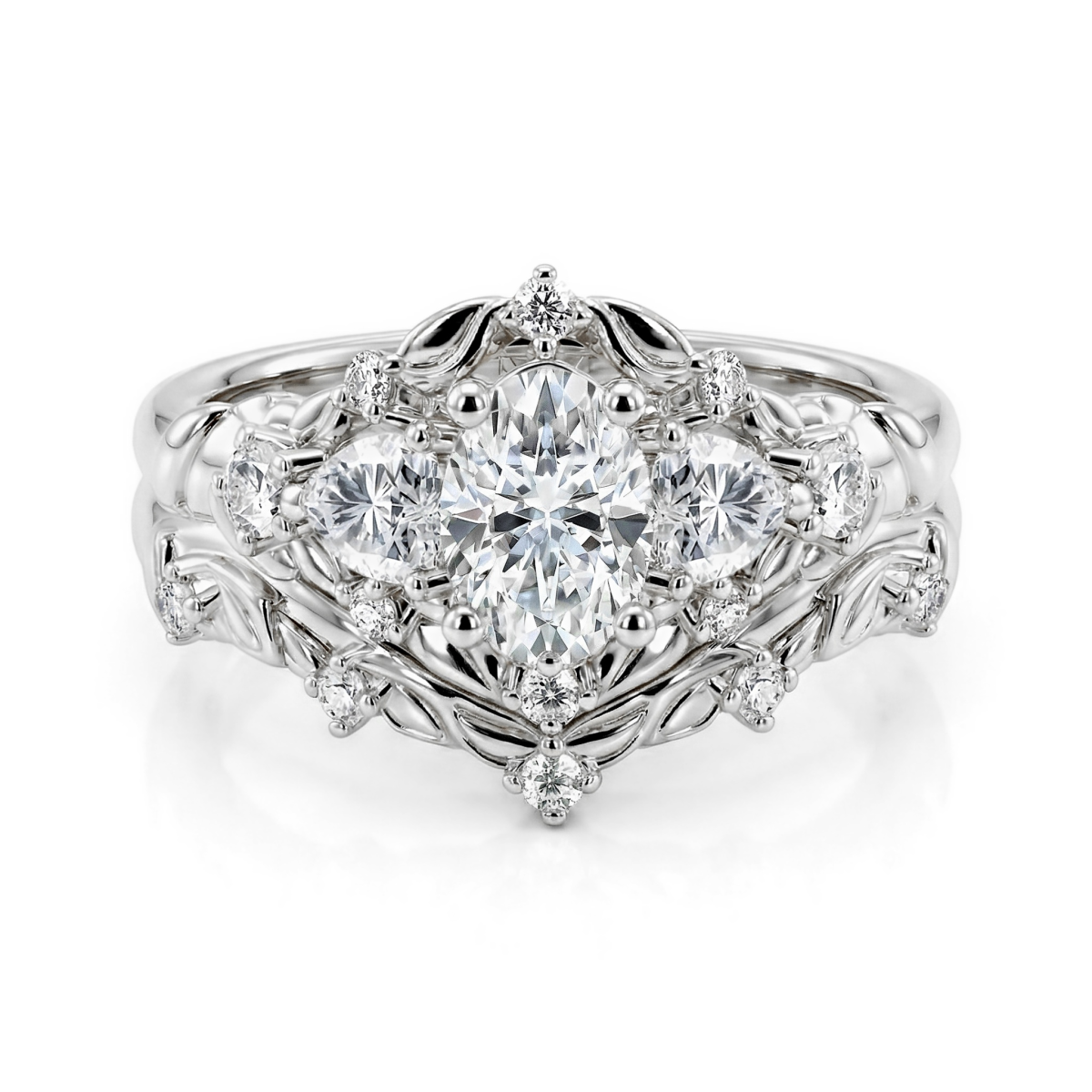 Fiorine - brudesett med ovalslipet moissanite og botanisk design